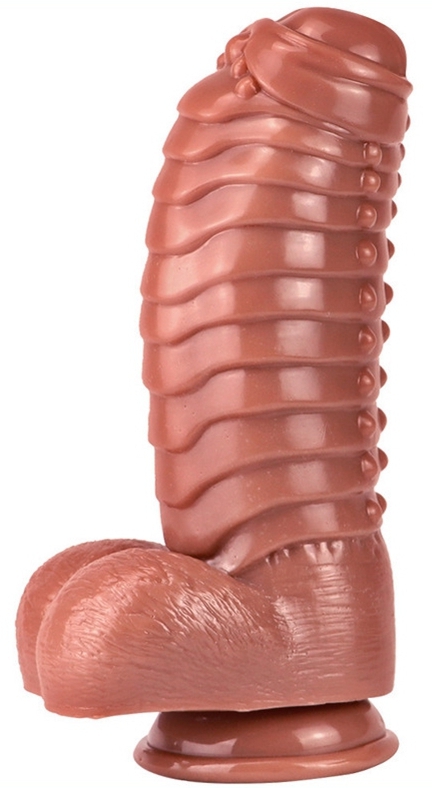 Ce gode Carapace est un sextoy conçu avec une forme volumineuse et une surface texturée