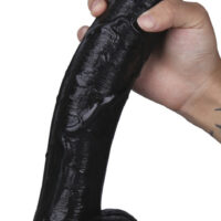 Gode noir avec un gland décalotté et une surface veinée Avec des bourses rondes et une base ventouse